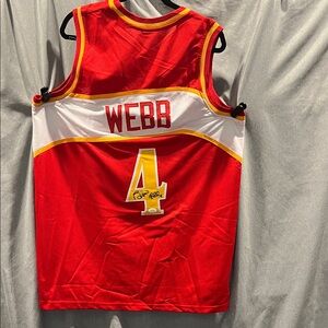 Autographed Spud Webb Jersey with JSA authentication